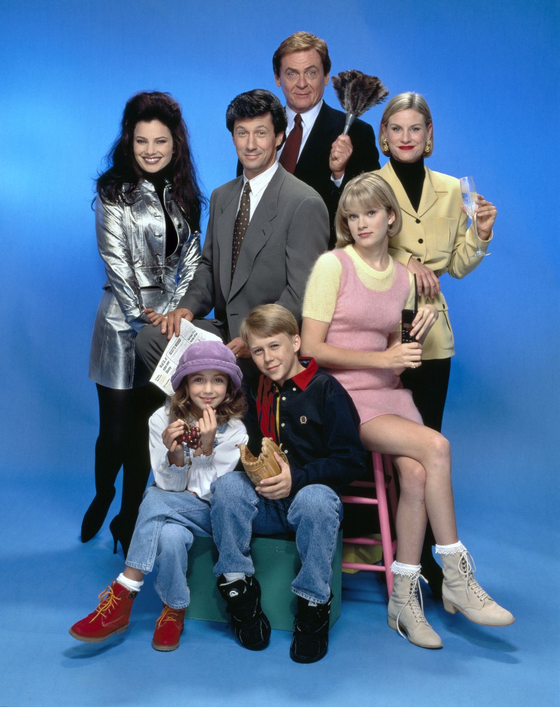 LOS ANGELES - JANUARY 1: The Nanny, a CBS television situation comedy. Premiere episode aired November 3, 1993. Pictured is from left is Fran Drescher (as Fran Fine), Charles Shaughnessy (as Maxwell Sheffield); Daniel Davis (as Niles); Lauren Lane (as C.C. Babcock). Seated in front from left is Madeline Zima (as Grace Sheffield); Benjamin Salisbury (as Brighton Sheffield); and Nicholle Tom (as Margaret 'Maggie' Sheffield). Image dated January 1, 1993. (Photo by CBS via Getty Images)