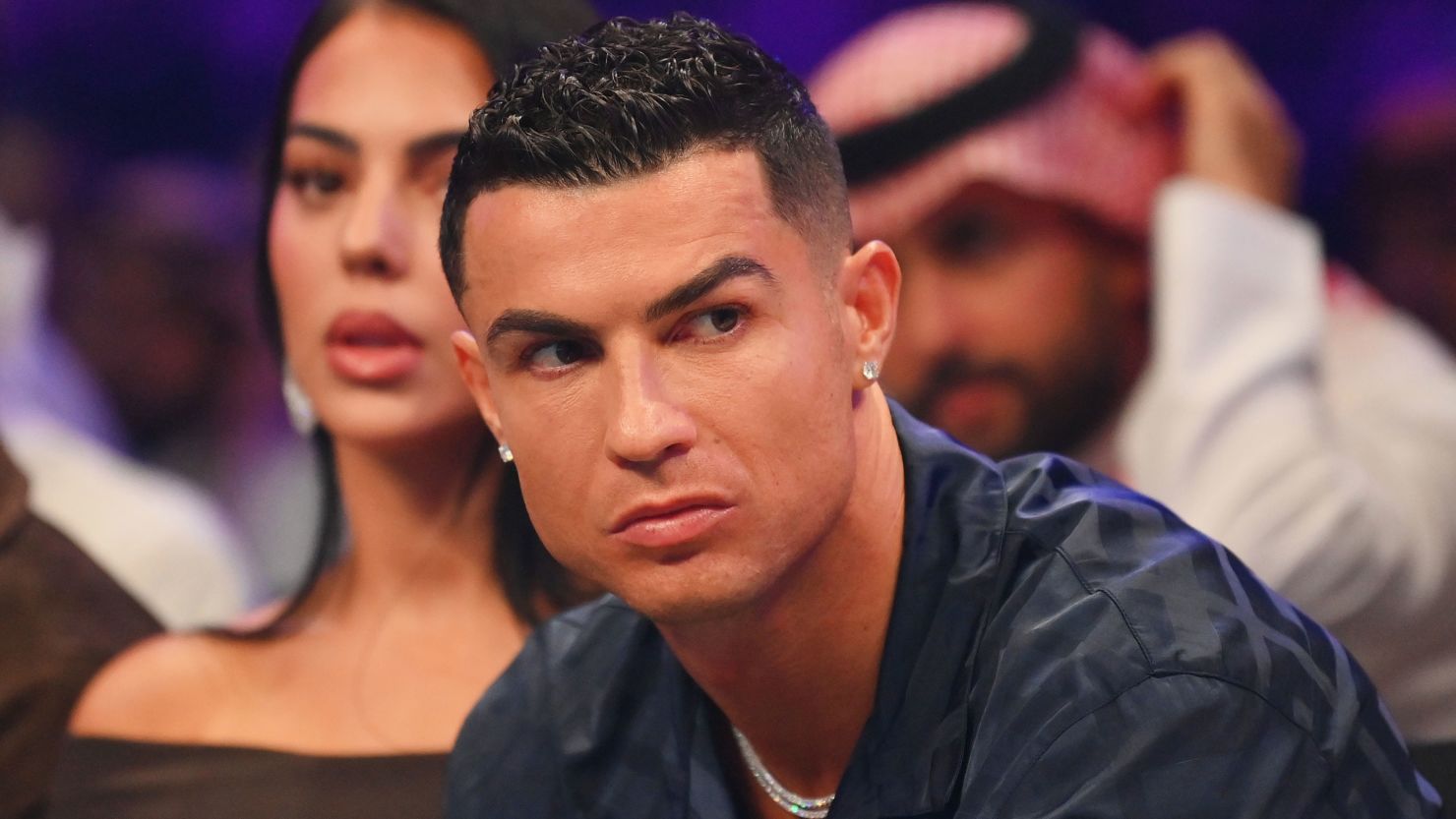 RIYADH, SAUDI ARABIA - OCTOBER 28: Cristiano Ronaldo looks on from ringside prior to the Heavyweight fight between Tyson Fury and Francis Ngannou at Boulevard Hall on October 28, 2023 in Riyadh, Saudi Arabia. (Photo by Justin Setterfield/Getty Images)