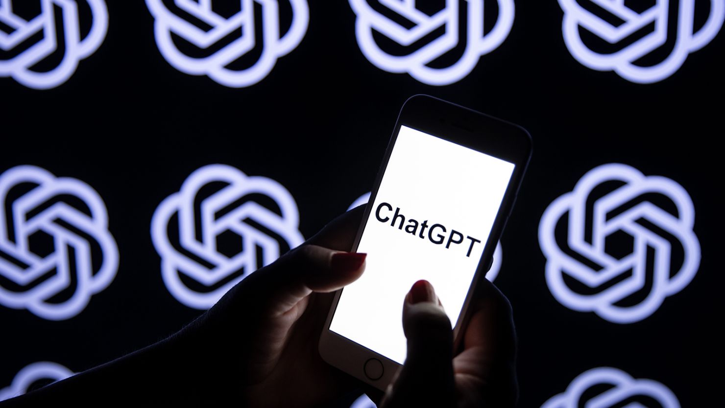 In this photo illustration, ChatGPT logo is being displayed on a mobile phone screen in front of computer screen on September 5, 2023 in Ankara, Turkiye.