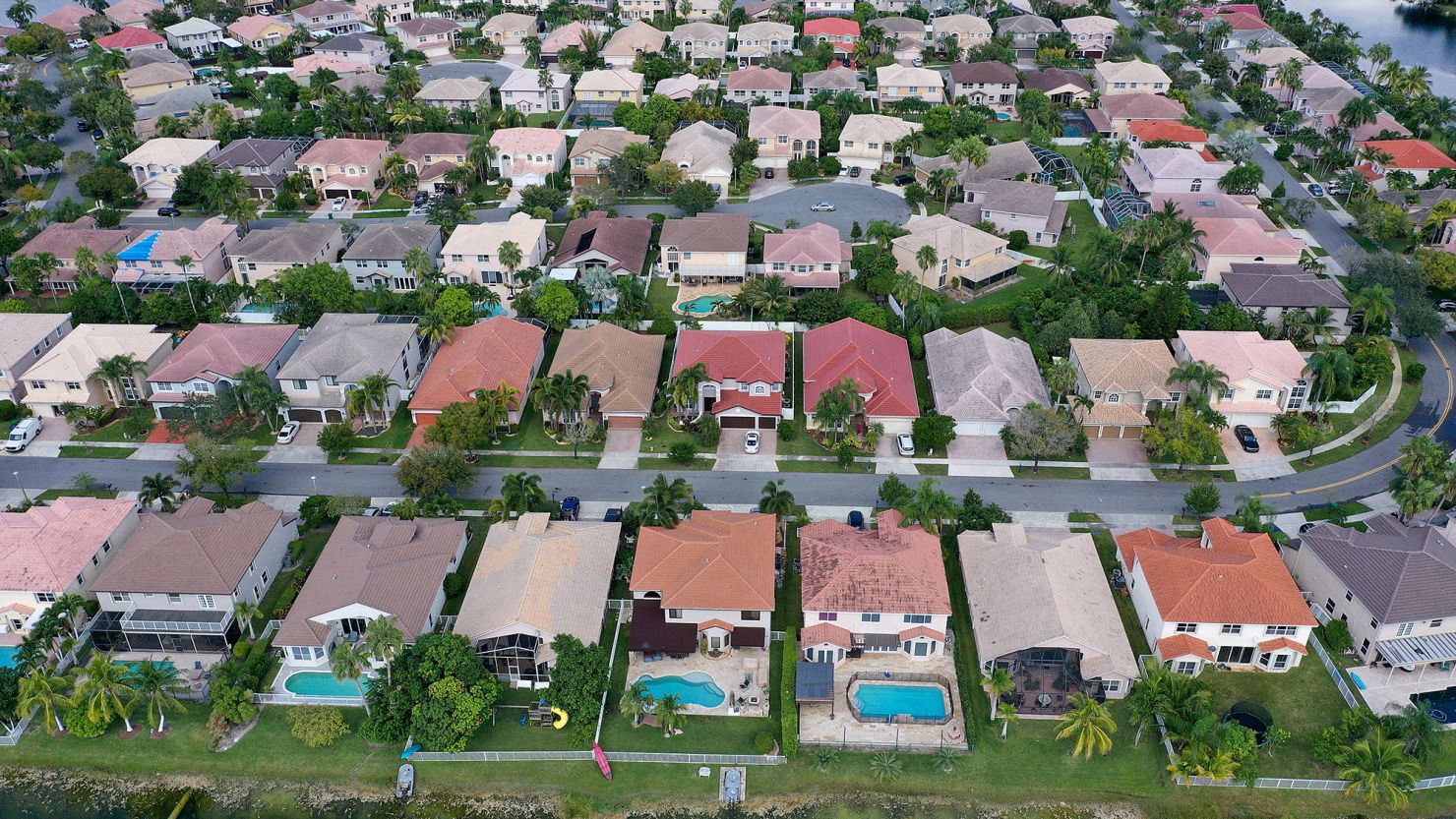 MIRAMAR, FLORIDA - OCTOBER 27:  In this aerial view, single family homes are shown in a residential neighborhood on October 27, 2022 in Miramar, Florida. The rate on the average 30-year fixed mortgage hit 7.08%, up from 6.94% the week prior, according to Freddie Mac. Mortgage rates surpassed 7% for the first time since April 2002. (Photo by Joe Raedle/Getty Images)