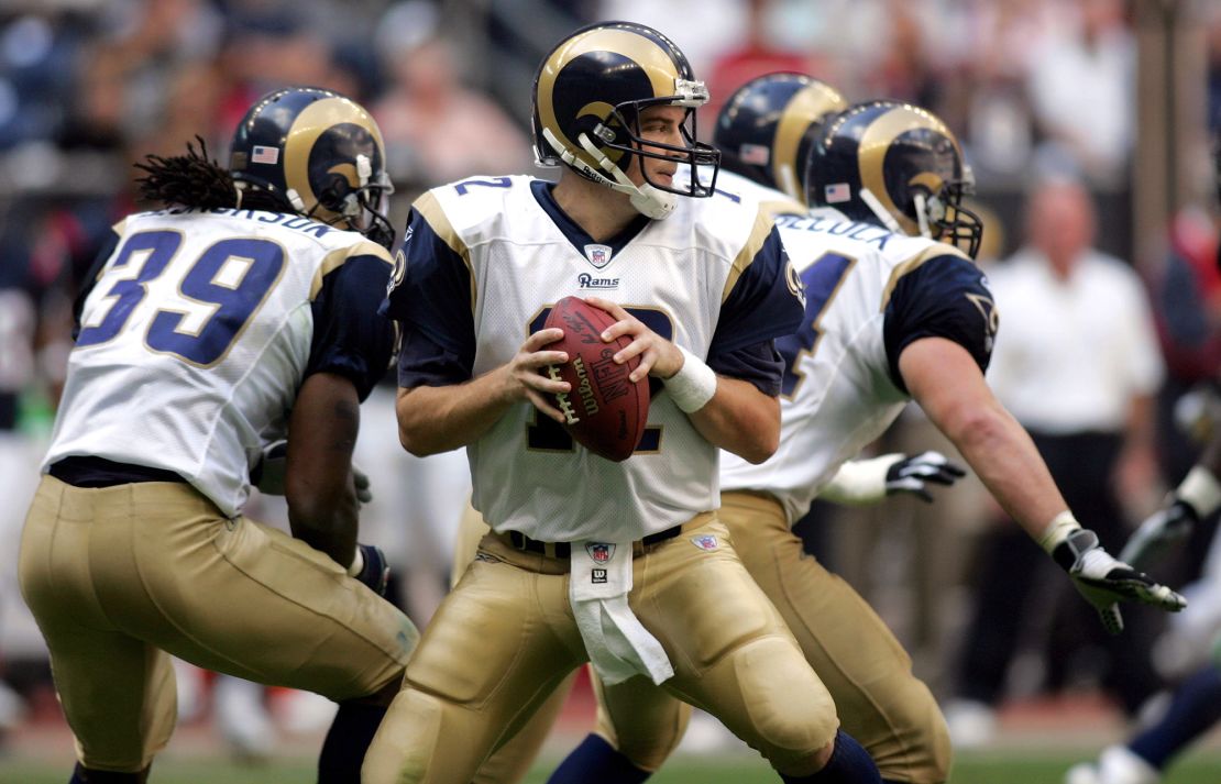 HOUSTON - NOVEMBER 27:  Quarterback Ryan Fitzpatrick #12 of the St. Louis Rams drops back to pass against the Houston Texans on November 27, 2005 at Reliant Stadium in Houston, Texas. The Rams defeated the Texans 33-27 in overtime.  (Photo by Ronald Martinez/Getty Images)
