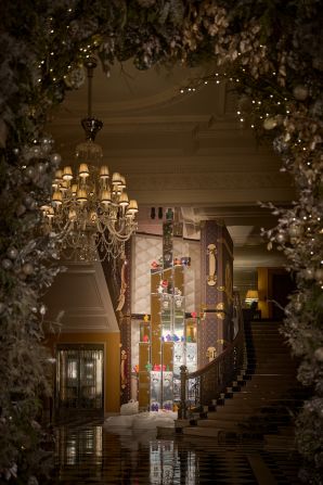 <strong>Claridge's:</strong> A freshly designed tree graces the lobby at luxurious Claridge's in London. This year's tree is by Louis Vuitton and features signature wardrobe trunks.