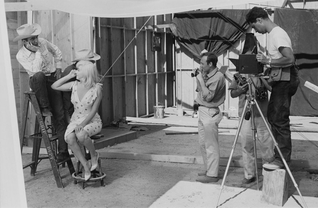 Magnum photographers Bruce Davidson and Elliott Erwitt set up a shot of Marilyn Monroe, Clark Gable and Montgomery Clift on the set of "The Misfits," being filmed on location in Nevada in 1960.