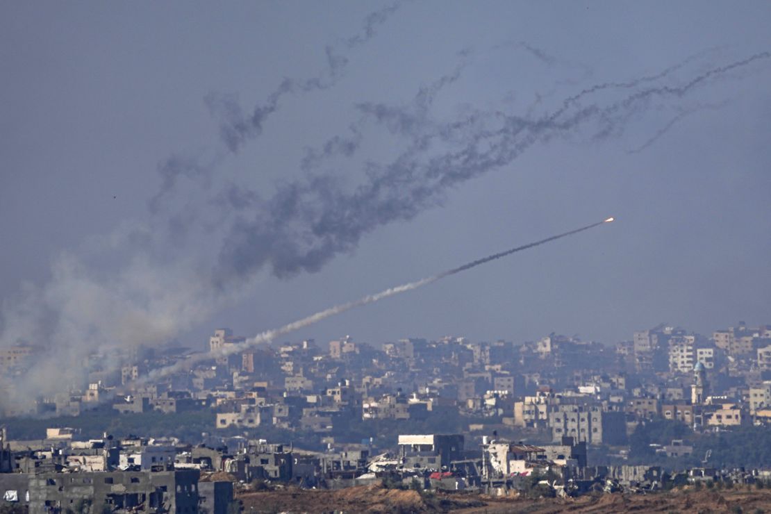 Rockets are fired toward Israel from the Gaza Strip, as seen from southern Israel, Friday, Dec. 1, 2023. (AP Photo/Ariel Schalit)