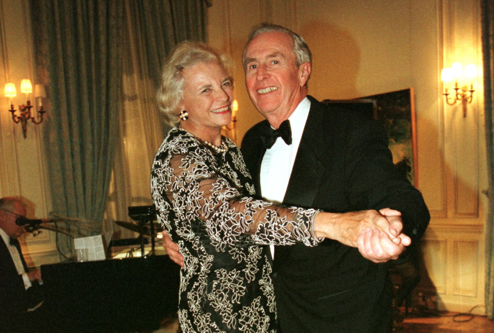 O'Connor dances with her husband, John, at a ball in Washington, DC, in 1998.
