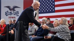 CEDAR FALLS, IOWA - JANUARY 27: Democratic presidential candidate former Vice President Joe Biden greets supporter as he arrives for a campaign town hall event in the Gallagher Bluedorn Performing Arts Center Atrium on the campus of University of Northern Iowa January 27, 2020 in Cedar Falls, Iowa. In a what appears to be a neck-and-neck race, Biden is ahead of rival candidate Sen. Bernie Sanders (I-VT) by 6 points in a USA Today/Suffolk University poll but is running behind Sanders by 8 points according to a New York Times/Siena College poll, both polls of likely Iowa caucus-goers conducted at about the same time. (Photo by Chip Somodevilla/Getty Images)