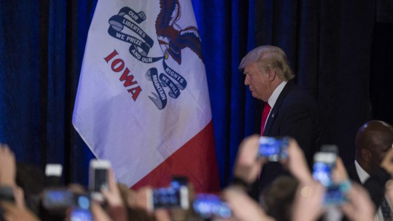 TOPSHOT - Republican Presidential candidate Donald Trump arrives to address his supporters after finishing second in the Iowa Caucus, in West Des Moines, Iowa, February 1, 2016. Republican Senator Ted Cruz has won the Iowa caucuses -- the first vote in the US presidential race -- in a tight contest with frontrunner Donald Trump and Senator Marco Rubio, US media projections showed. (Photo by Jim WATSON / AFP) (Photo by JIM WATSON/AFP via Getty Images)