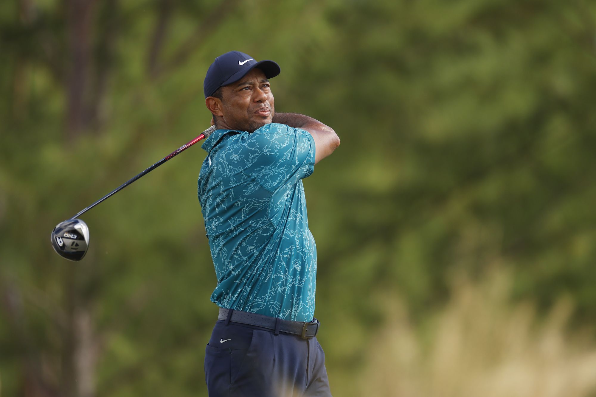 Tiger Woods improves on day two of his long-awaited return to golf