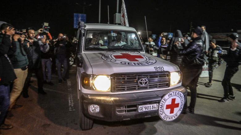 26 November 2023, Palestinian Territories, Rafah: A Red Cross vehicle believed to be carrying hostages abducted by Hamas militants during the October 7th attack on Israel, arrives at the Rafah border, amid a hostages-prisoners swap deal between Hamas and Israel.