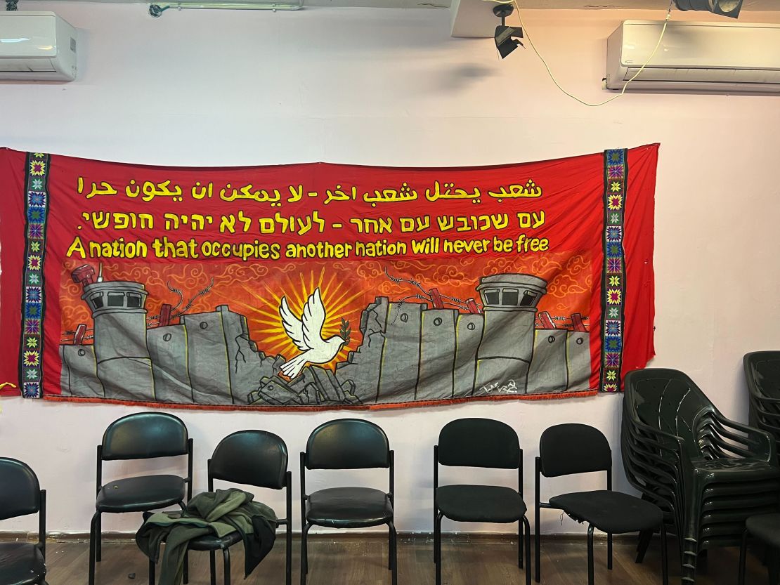 A banner is seen at a left wing community space in Tel Aviv on November 27.