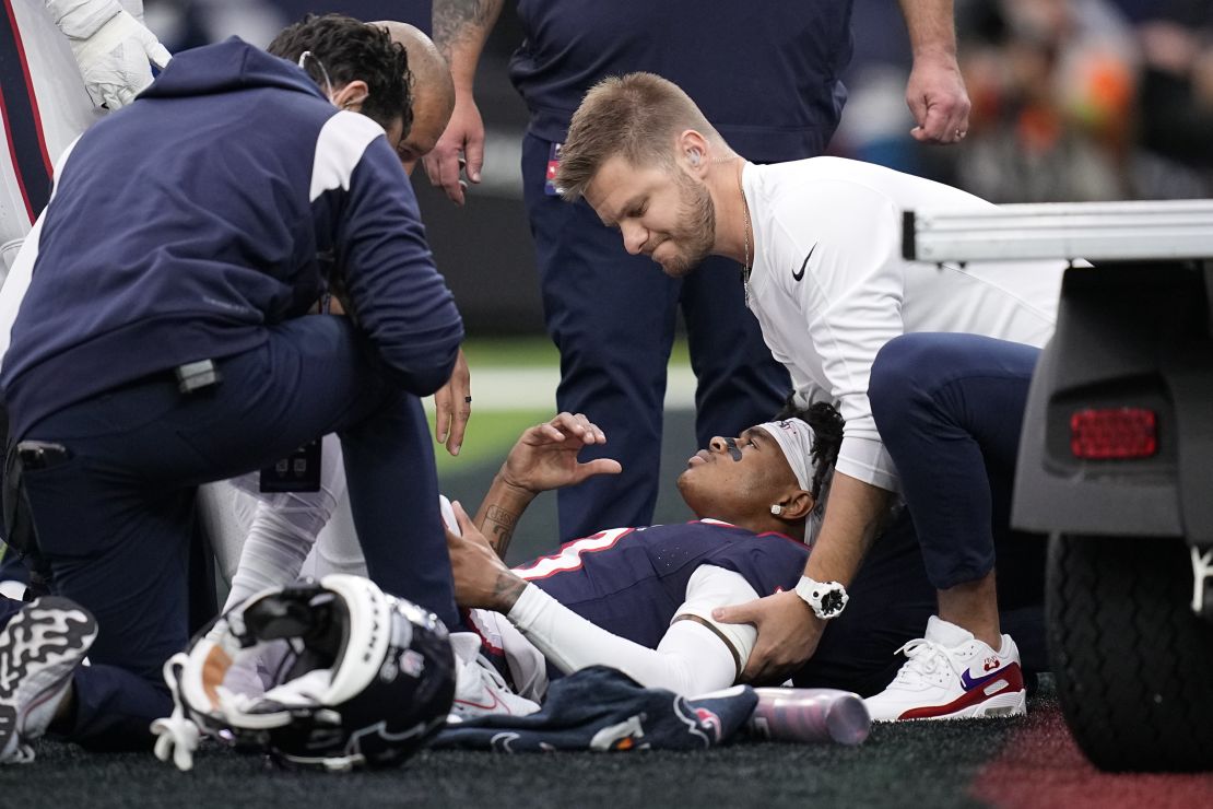 Houston Texans wide receiver Tank Dell is attended to after being injured in the first half of an NFL football game against the Denver Broncos Sunday, Dec. 3, 2023, in Houston. (AP Photo/Eric Gay)