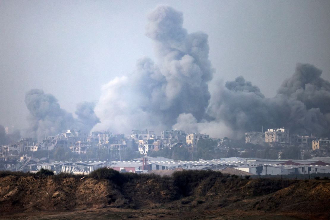 This picture taken from southern Israel near the border with the Gaza Strip on December 3, 2023, shows smoke billowing over the Palestinian enclave during Israeli bombardment amid continuing battles between Israel and the militant group Hamas. Israel carried out deadly bombardments in Gaza on December 3 as international calls mounted for greater protection of civilians and the renewal of an expired truce with Palestinian militant group Hamas. (Photo by Menahem KAHANA / AFP) (Photo by MENAHEM KAHANA/AFP via Getty Images)