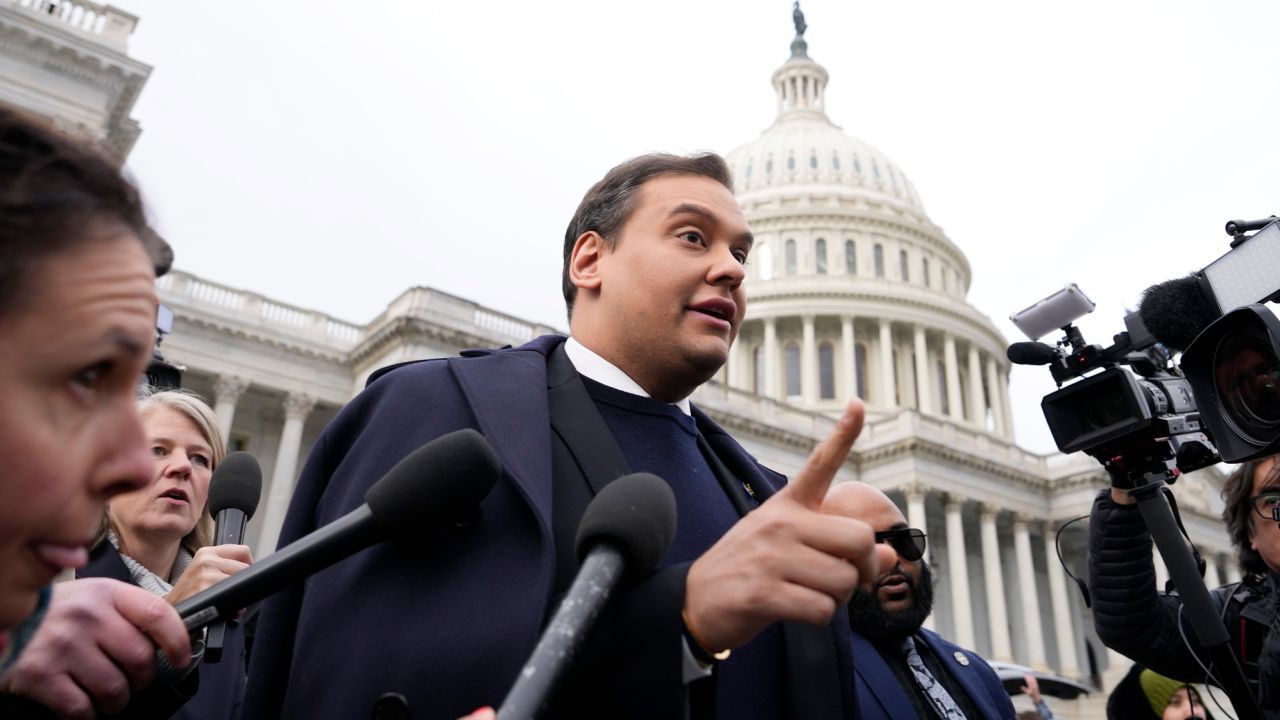 WASHINGTON, DC - DECEMBER 01: Rep. George Santos (R-NY) is surrounded by journalists as he leaves the U.S. Capitol after his fellow members of Congress voted to expel him from the House of Representatives on December 01, 2023 in Washington, DC. Charged by the U.S. Department of Justice with 23 felonies in New York including fraud and campaign finance violations, Santos, 35, was expelled from the House of Representatives by a vote of 311-114. Santos is only the sixth person in U.S. history to be expelled from the House of Representatives. (Photo by Drew Angerer/Getty Images)