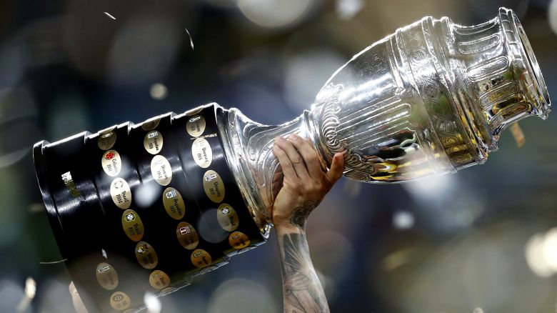 RIO DE JANEIRO, BRAZIL - JULY 07: Dani Alves of Brazil lifts the trophy during the Copa America Brazil 2019 Final match between Brazil and Peru at Maracana Stadium on July 07, 2019 in Rio de Janeiro, Brazil. (Photo by Lucas Uebel/Getty Images)