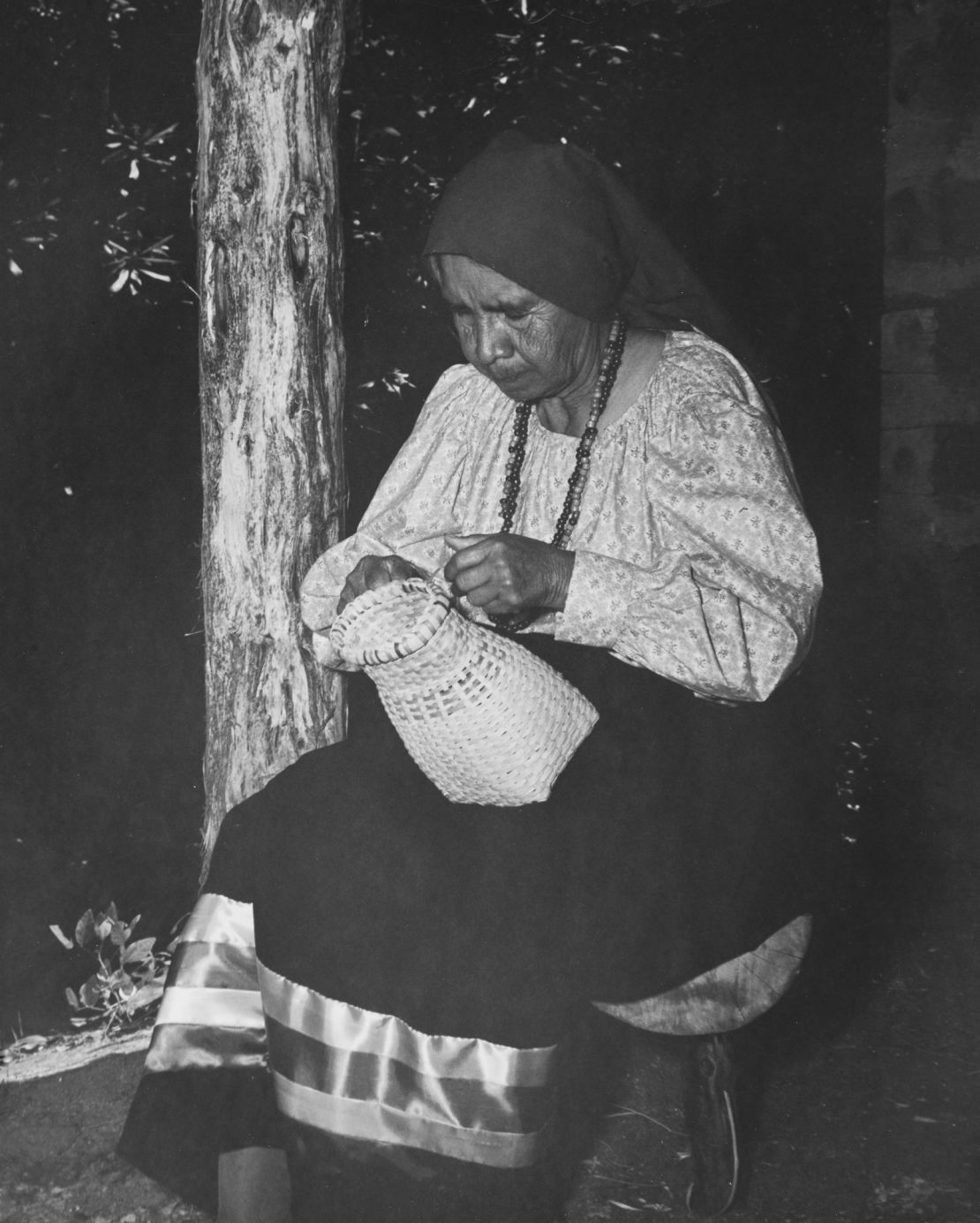 Molly Sequoyah of the Cherokee Nation making a handmade basket made with white oak slats, North Carolina, US, circa 1940. (Photo by FPG/Archive Photos/Getty Images)