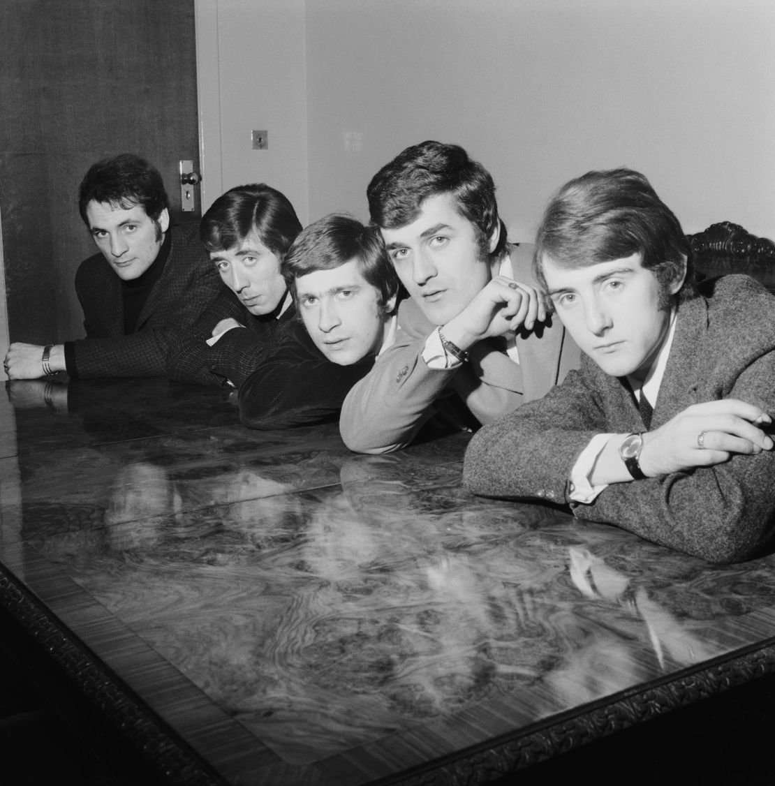 12th February 1965:  British pop group, The Moody Blues at a meeting in their shared house in south London. Left to right : Mike Pinder, Clint Warwick, Graeme Edge, Ray Thomas and Denny Laine.  (Photo by Chris Ware/Keystone Features/Getty Images)
