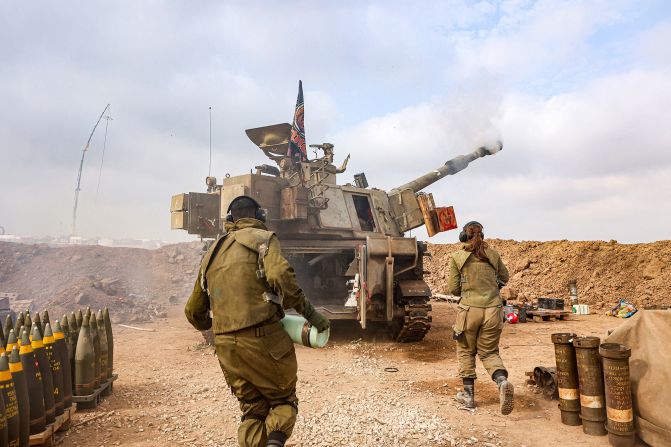 An Israeli artillery unit fires near the border with Gaza on December 5.