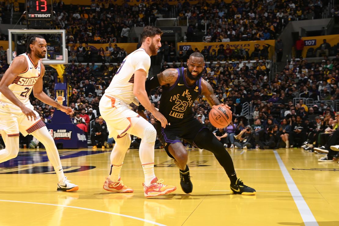 LOS ANGELES, CA - DECEMBER 5: LeBron James #23 of the Los Angeles Lakers dribbles the ball during the game against the Phoenix Suns during the quarterfinals of the In-Season Tournament on December 5, 2023 at Crypto.Com Arena in Los Angeles, California. NOTE TO USER: User expressly acknowledges and agrees that, by downloading and/or using this Photograph, user is consenting to the terms and conditions of the Getty Images License Agreement. Mandatory Copyright Notice: Copyright 2023 NBAE (Photo by Andrew D. Bernstein/NBAE via Getty Images)