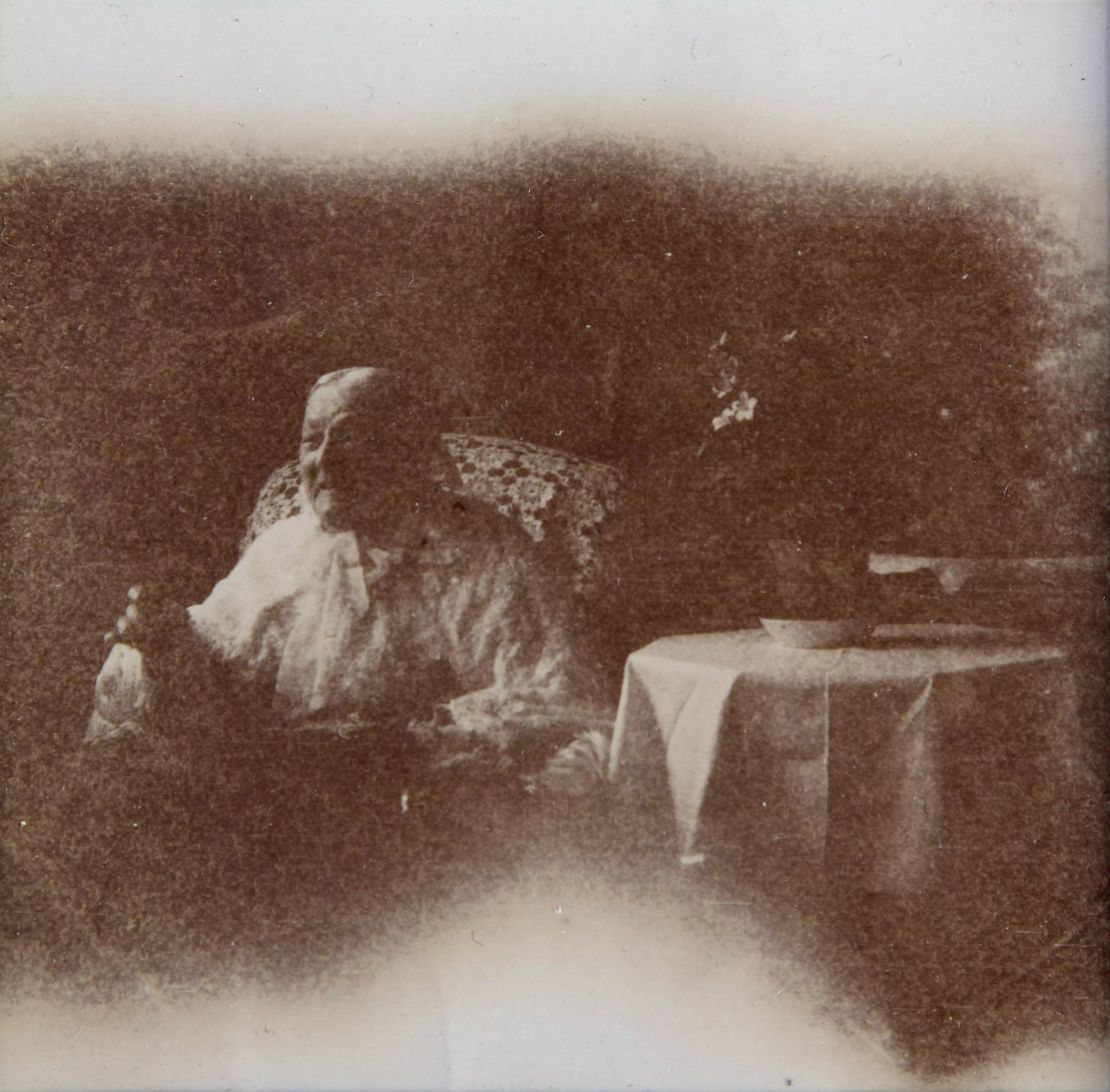 A photo from the sale shows Nightingale sitting in an armchair.