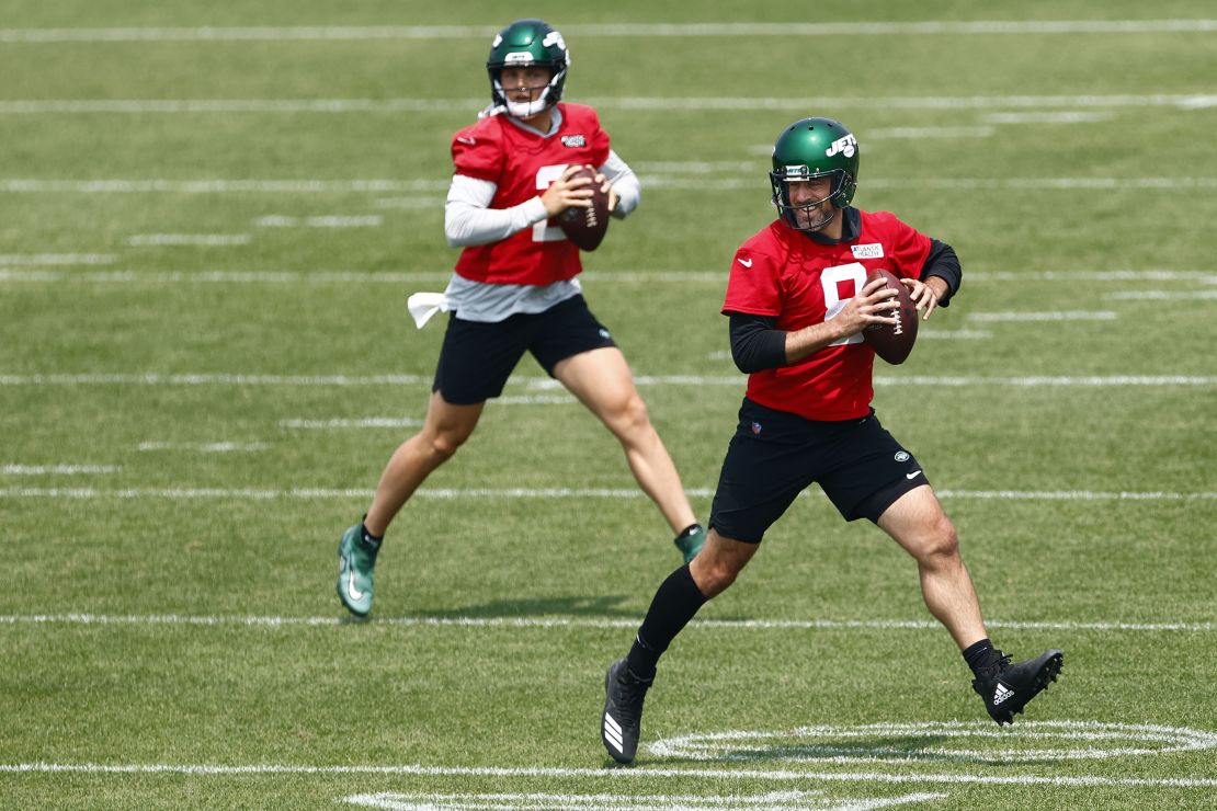 FLORHAM PARK, NEW JERSEY - JUNE 6: Quarterbacks Aaron Rodgers #8 and Zach Wilson #2 of the New York Jets drop back to pass during the teams OTAs at Atlantic Health Jets Training Center on June 6, 2023 in Florham Park, New Jersey. (Photo by Rich Schultz/Getty Images)