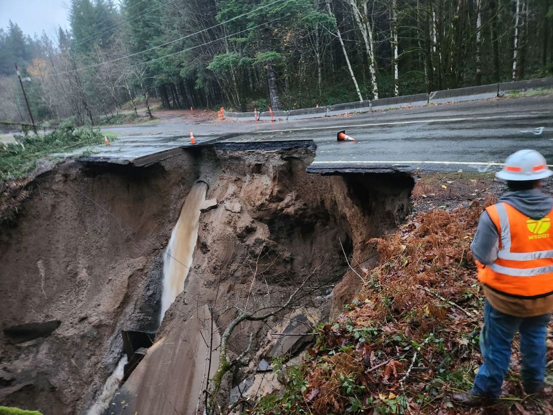 The side of a rural highway in Washington state collapsed Tuesday due to intense water flows both over and under the roadway as the region experiences heavy rain from atmospheric rivers.State Route 503 in Cowlitz County is closed until further notice.