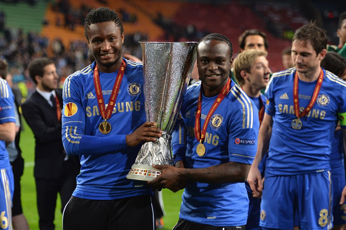 Chelsea's John Obi Mikel, Victor Moses celebrates winning the Europa League trophy after winning the UEFA Europa League Final match between FC Benfica and Chelsea at the Amsterdam Arena on 15th May 2013 in Amsterdam, Holland.  (Photo by Darren Walsh/Chelsea FC via Getty Images)