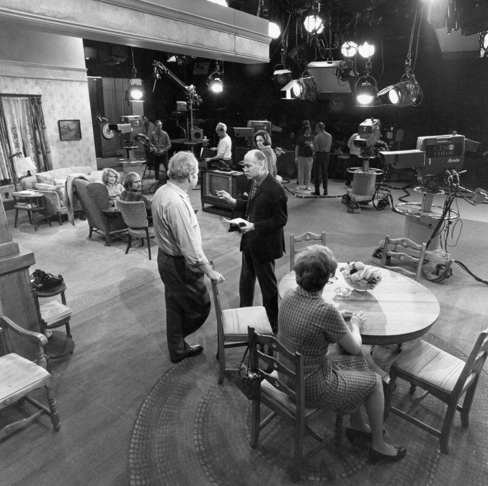 Lear, at center in the dark blazer, talks with Carroll O'Connor on the set of "All in the Family" in 1971. That year, it won a Primetime Emmy for outstanding new series.