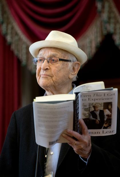 Lear holds his 2014 memoir, "Even <em>This</em> I Get to Experience."