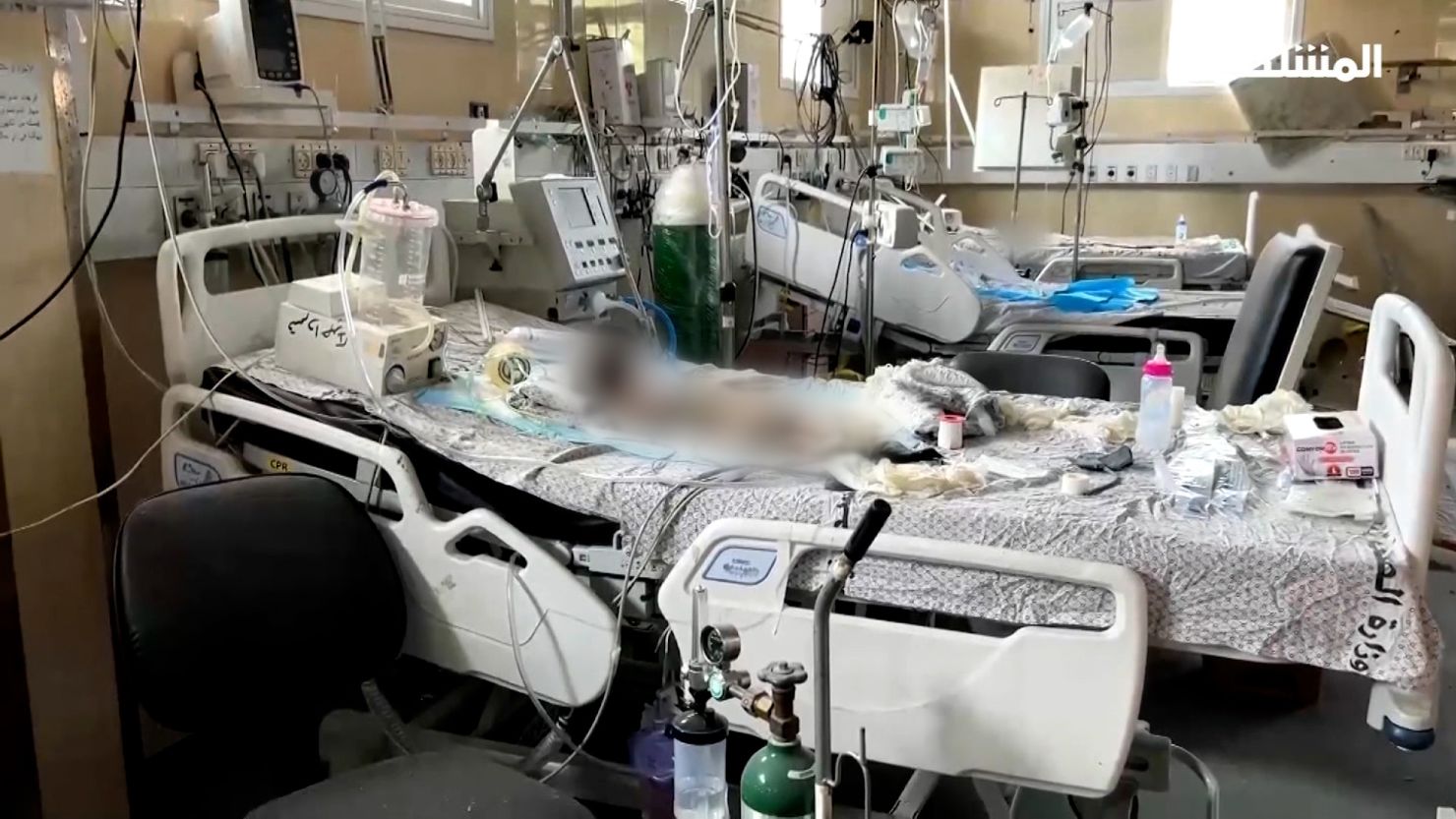 The bodies of decomposing babies are seen on hospital beds inside the Al-Nasr hospital ICU ward in northern Gaza, in this screen grab taken from a video filmed by Al Mashhad reporter Mohamed Baalousha, reportedly on November 27. The image has been blurred due to its graphic nature.