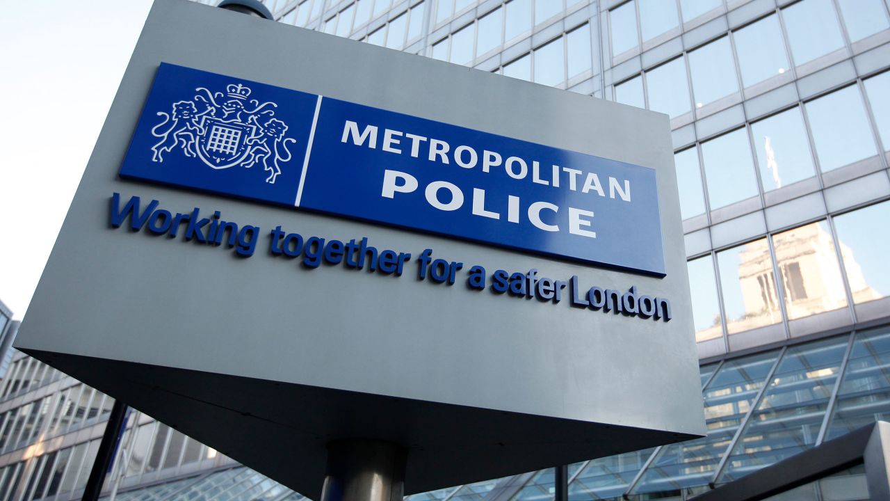 FILE - A general view of New Scotland Yard, the headquarters of the London Metropolitan Police on Feb. 3, 2012. London police have charged a deputy U.S. Marshal in the United Kingdom with entering an aircraft while drunk after he was arrested on allegations of misconduct aboard a flight from New York. The 39-year-old was arrested on Thursday, Dec. 7, 2023, upon arrival at Heathrow Airport. (AP Photo/Alastair Grant, File)