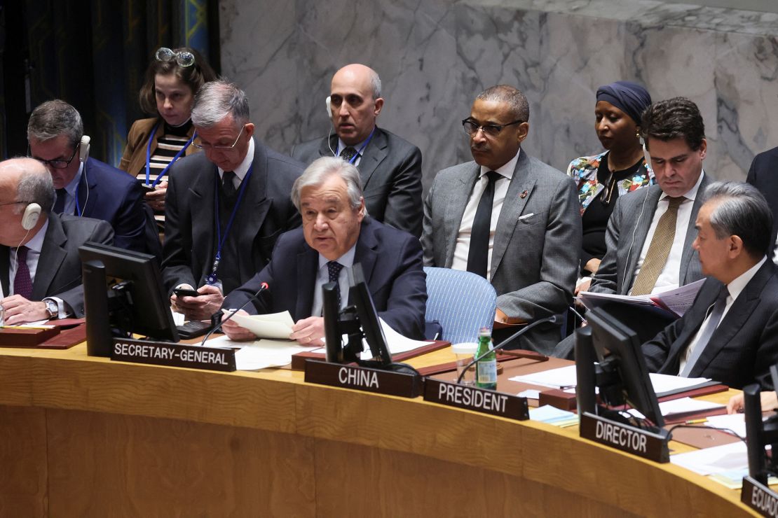 China's Foreign Minister Wang Yi and United Nations Secretary-General Antonio Guterres attend a UN Security Council meeting on the conflict between Israel and Hamas, in New York City, New York, U.S., November 29, 2023. REUTERS/Brendan McDermid