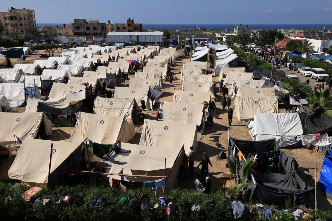 TOPSHOT - Tents for Palestinians seeking refuge are set up on the grounds of a United Nations Relief and Works Agency for Palestine Refugees (UNRWA) centre in Khan Yunis in the southern Gaza Strip on October 19, 2023, amid the ongoing battles between Israel and the Palestinian group Hamas. (Photo by MAHMUD HAMS / AFP) (Photo by MAHMUD HAMS/AFP via Getty Images)