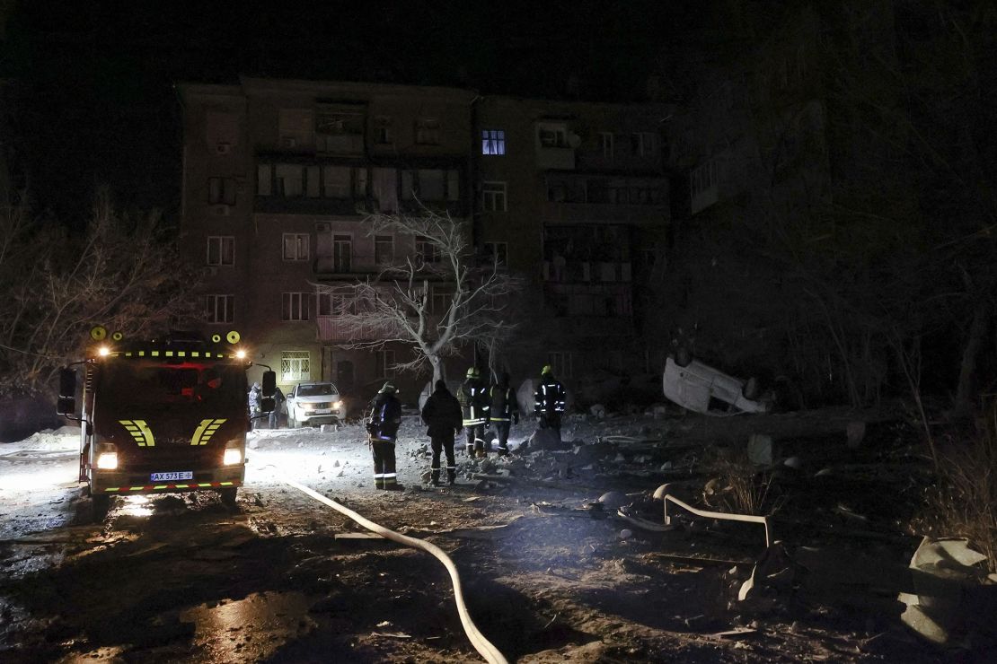 Mandatory Credit: Photo by SERGEY KOZLOV/EPA-EFE/Shutterstock (14248942b)Emergency service personnel inspect the scene following an overnight shelling in Kharkiv, eastern Ukraine, 08 December 2023, amid the Russian invasion. At least one person was injured as a result of the attack, the State Emergency Service said. Russian troops entered Ukraine in February 2022 starting a conflict that has provoked destruction and a humanitarian crisis.At least one injured following shelling on Kharkiv, eastern Ukraine - 08 Dec 2023
