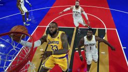 Los Angeles Lakers forward LeBron James (23) shoots the ball against New Orleans Pelicans forward Zion Williamson (1) during a semifinal game in the NBA basketball In-Season Tournament, Thursday, Dec. 7, 2023, in Las Vegas. (Kyle Terada/Pool Photo via AP)
