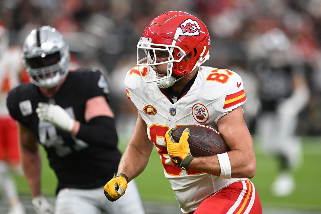 LAS VEGAS, NEVADA - NOVEMBER 26: Travis Kelce #87 of the Kansas City Chiefs runs with the ball during the second quarter against the Las Vegas Raiders at Allegiant Stadium on November 26, 2023 in Las Vegas, Nevada. (Photo by Candice Ward/Getty Images)