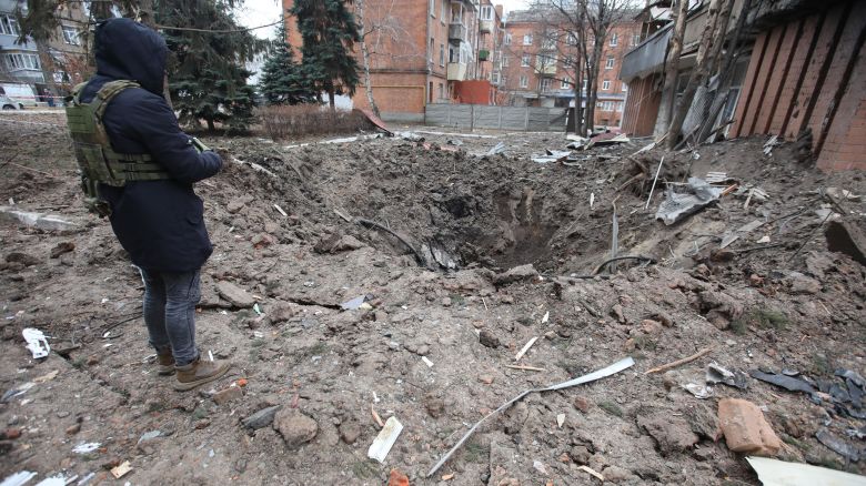 A person in a bulletproof vest stands on the edge of a crater left by a Russian rocket during a Russian missile attack on Kharkiv, northeastern Ukraine. As reported, on Friday night, Russian troops struck Kharkiv with allegedly S-300  missiles.
Kharkiv after Russian missile attack, Ukraine - 08 Dec 2023