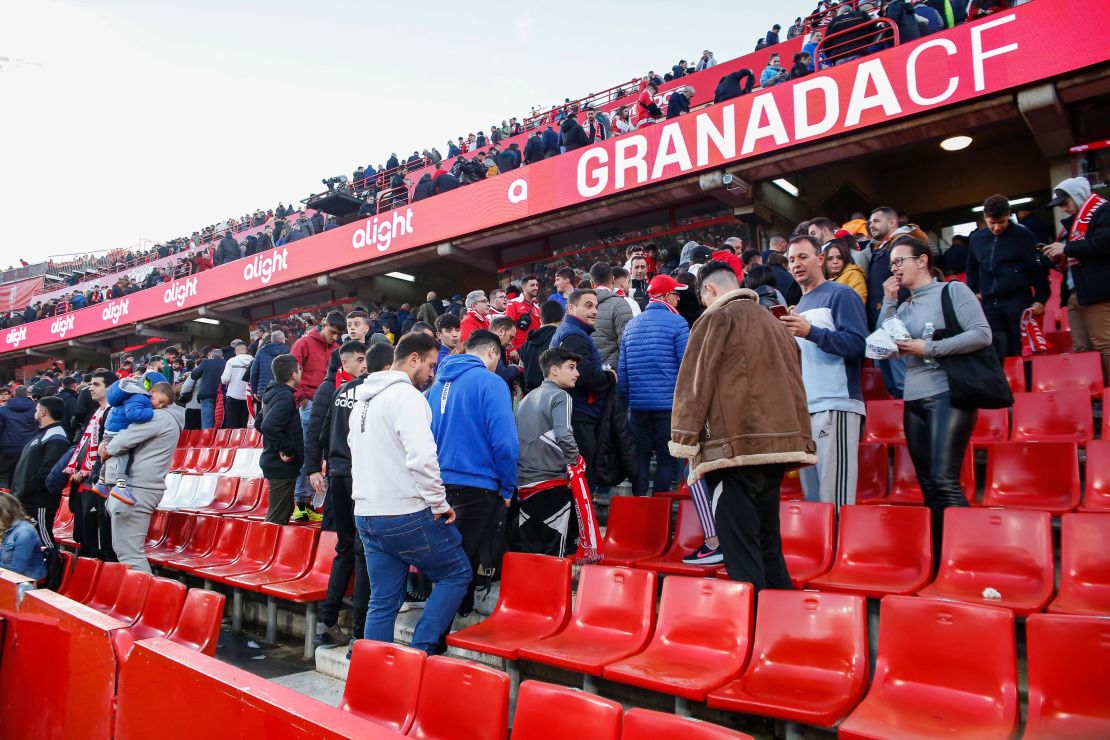 SPAIN - DECEMBER 10: Fans leave the stadium after LaLiga decided to cancel the match due a fan died of a heart attack during the Spanish league, La Liga EA Sports, football match played between Granada CF and Athletic Club at Nuevo Los Carmenes stadium on December 10, 2023, in Granada, Spain. (Photo By Alex Camara/Europa Press via Getty Images)