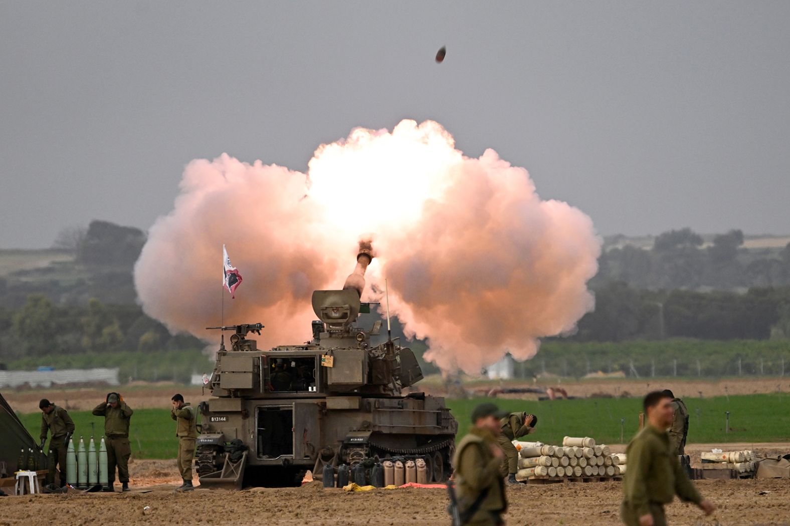 An Israeli howitzer fires into Gaza from a position near Nahal Oz, Israel on December 10.