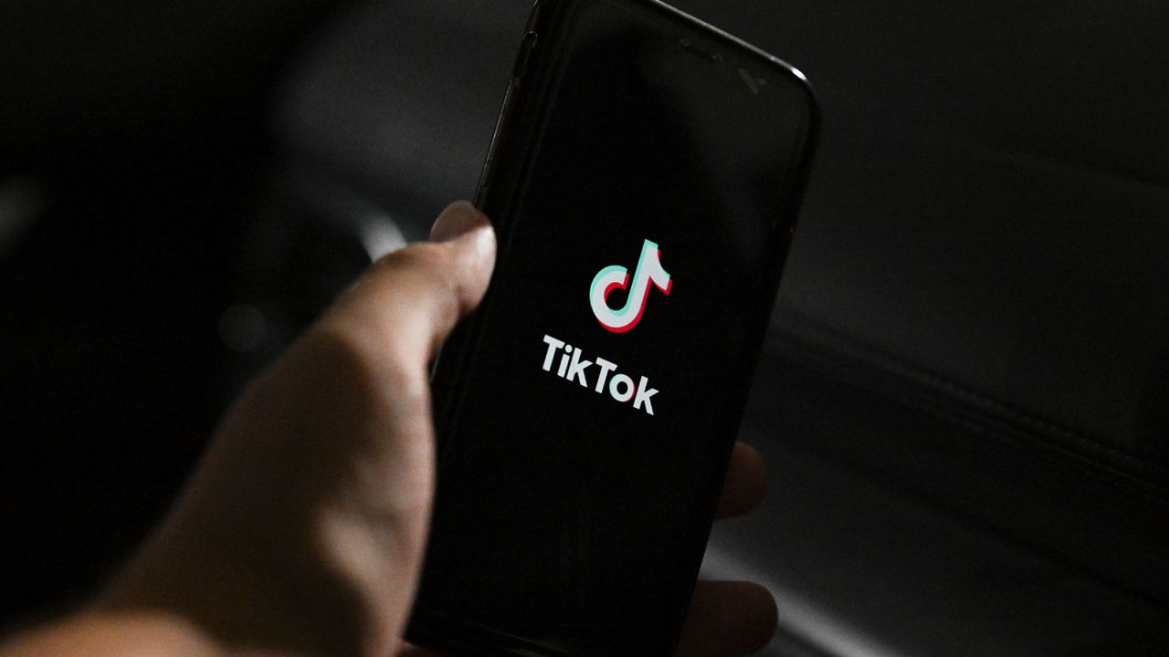 The TikTok app logo is seen on a phone in Melbourne, Tuesday, April 4, 2023. Australia is the latest country to ban TikTok from government devices following advice from national intelligence agencies.