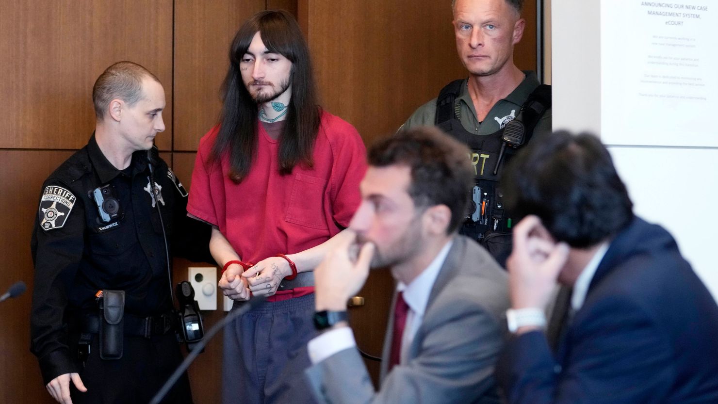 Robert E. Crimo III, is escorted into a courtroom during a case management conference before Judge Victoria A. Rossetti at the Lake County Courthouse on Monday.