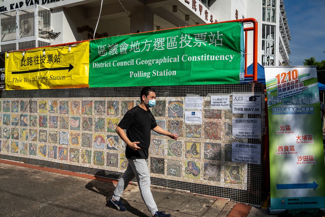 A man is arriving at the Near Boundary Polling Stations for the 2023 District Council Election in Hong Kong, China, on December 10, 2023.