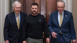 Ukrainian President Volodymyr Zelenskyy, center, is escorted by Senate Minority Leader Mitch McConnell, R-Ky., left, and Senate Majority Leader Chuck Schumer, D-N.Y., and as he comes to the Capitol in Washington to issue a plea for Congress to break its deadlock and approve continued wartime funding for Ukraine, Tuesday, Dec. 12, 2023. (AP Photo/J. Scott Applewhite)