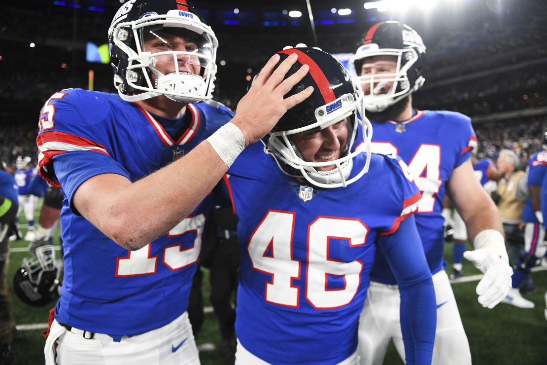 EAST RUTHERFORD, NJ - DECEMBER 11: Tommy DeVito #15 and Randy Bullock #46 of the New York Giants celebrate following the game against the Green Bay Packers at MetLife Stadium on December 11, 2023 in East Rutherford, New Jersey. (Photo by Kathryn Riley/Getty Images)