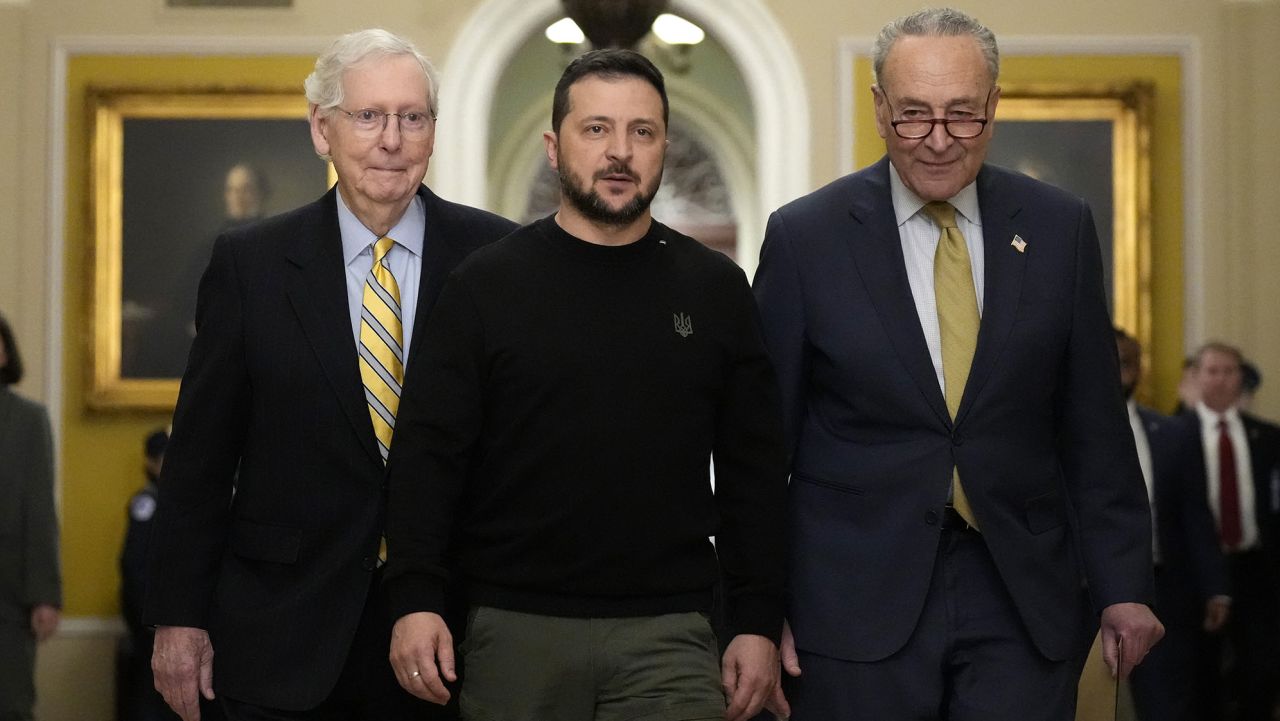 WASHINGTON, DC - DECEMBER 12: Ukrainian President Volodymyr Zelensky (C) walks with Senate Minority Leader Mitch McConnell (R-KY) (L) and Senate Majority Leader Charles Schumer (D-NY) as he arrives at the U.S. Capitol to meet with Congressional leadership on December 12, 2023 in Washington, DC. President Zelensky is meeting with President Biden and Congressional leaders to make an in-person case for continuing military aid as the country runs out of money for Ukraine's war against Russia. The meetings come days after the Senate failed to advance President Biden's national security package that included aid to Ukraine. (Photo by Drew Angerer/Getty Images)