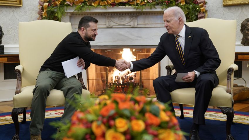 President Joe Biden shakes hands with Ukrainian President Volodymyr Zelenskyy as they meet in the Oval Office of the White House, Tuesday, Dec. 12, 2023, in Washington. (AP Photo/Evan Vucci)