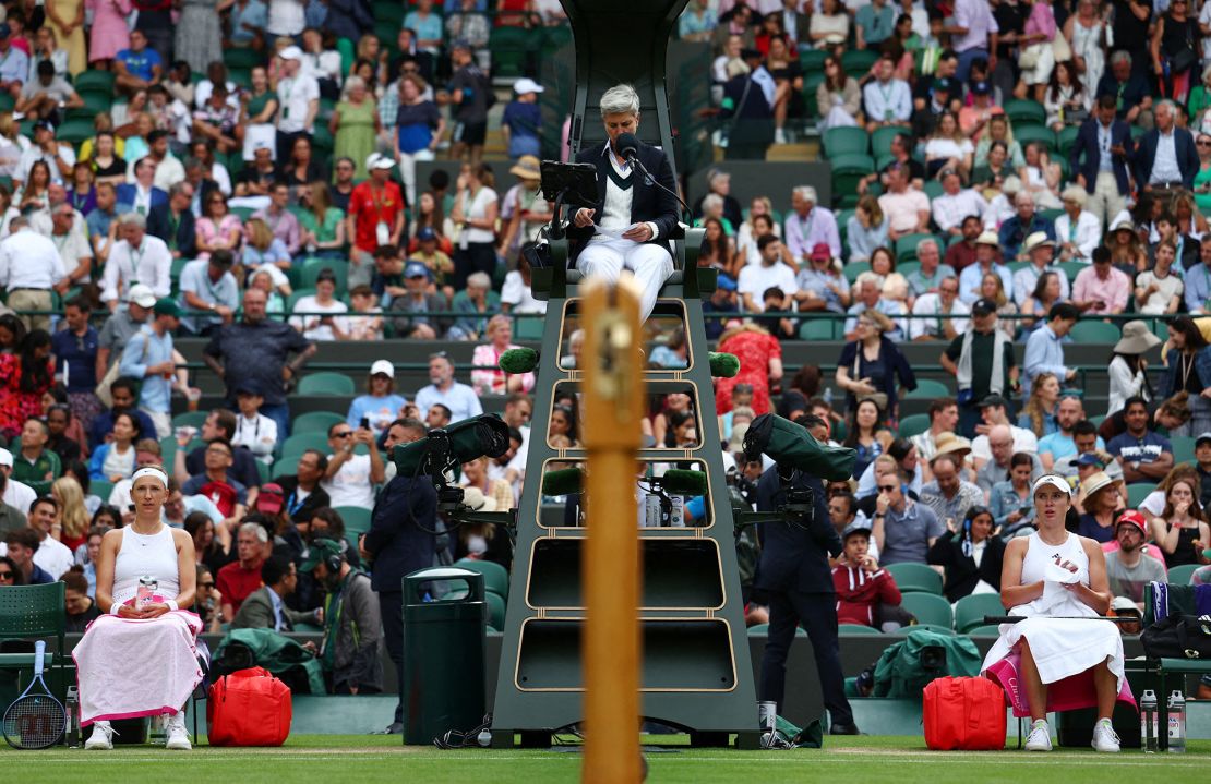 Tennis - Wimbledon - All England Lawn Tennis and Croquet Club, London, Britain - July 9, 2023 Belarus' Victoria Azarenka and Ukraine's Elina Svitolina look on during a break in their fourth round match REUTERS/Toby Melville TPX IMAGES OF THE DAY