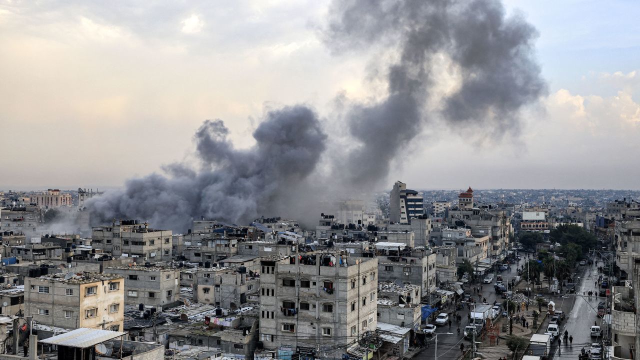 Smoke billows during Israeli bombardment in Rafah in the southern Gaza Strip on December 12, 2023, amid ongoing battles between Israel and the militant group Hamas. (Photo by MAHMUD HAMS / AFP) (Photo by MAHMUD HAMS/AFP via Getty Images)