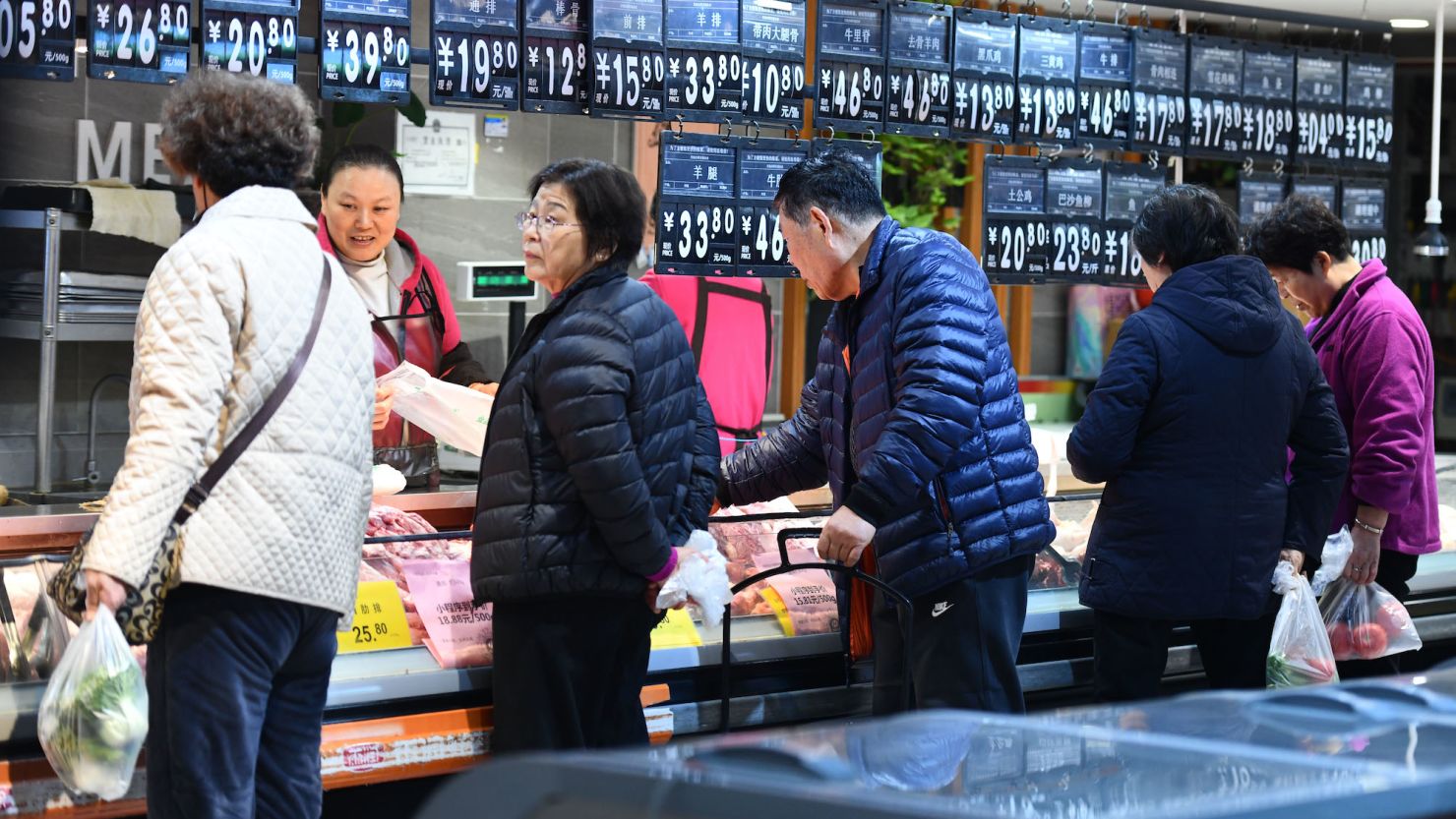 FUYANG, CHINA - DEEMBER 9, 2023 - Customers shop at a supermarket in Fuyang City, East China's Anhui Province, Dec 9, 2023. (Photo credit should read CFOTO/Future Publishing via Getty Images)