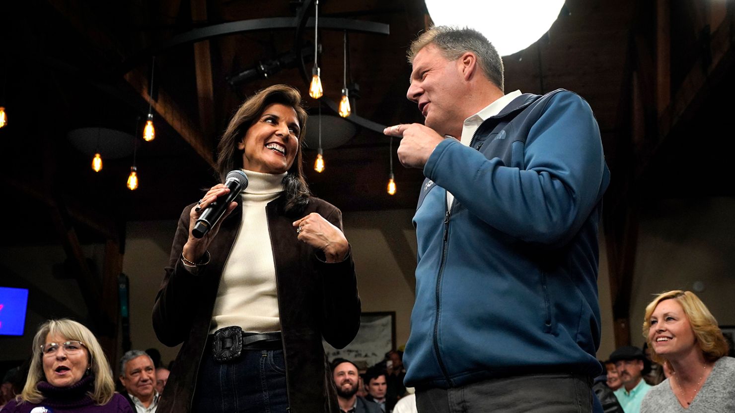 Republican presidential candidate Nikki Haley and Gov. Chris Sununu appear at a town hall campaign event, Tuesday, December 12, 2023, in Manchester, N.H. Haley received the New Hampshire governor's endorsement.