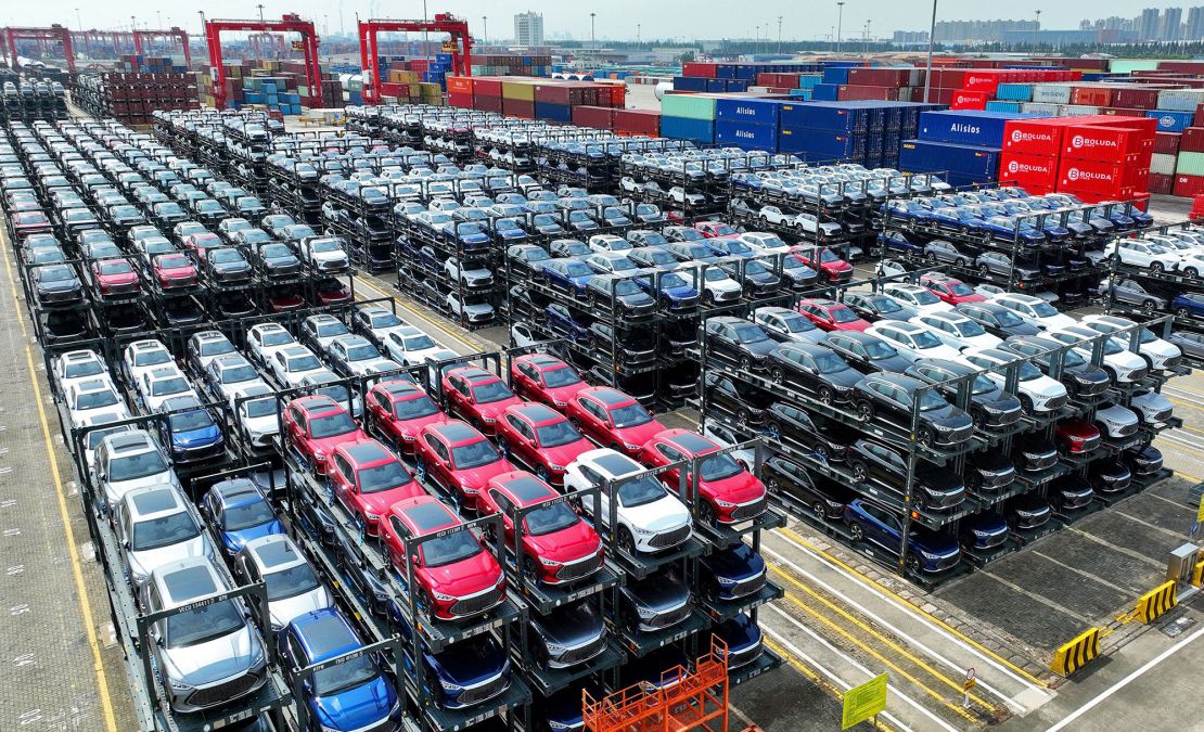 In this photo taken on September 11, 2023, BYD electric cars waiting to be loaded on a ship are stacked at the international container terminal of Taicang Port at Suzhou Port, in China's eastern Jiangsu Province. (Photo by AFP) / China OUT (Photo by -/AFP via Getty Images)